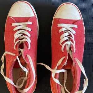 UGG orange sneakers.